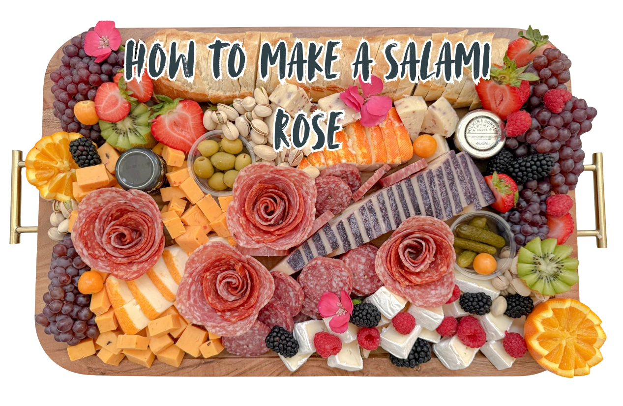 Picture of a charcuterie board by Fork and Flare with a salami rose showing how to create a salami rose for a charcuterie board, step-by-step guide to folding salami for grazing and cheese boards.