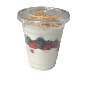 Large 12-ounce parfait cup from Fork and Flare made in house in Orange County, California, featuring non-fat Greek yogurt layered with fresh raspberries, strawberries, blueberries, and blackberries, topped with oats and granola; a healthy handcrafted breakfast parfait perfect for Irvine, Newport Beach, Laguna Niguel, Costa Mesa, and nearby Orange County areas.