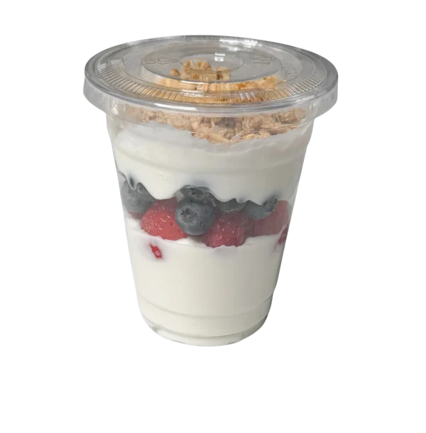 Large 12-ounce parfait cup from Fork and Flare made in house in Orange County, California, featuring non-fat Greek yogurt layered with fresh raspberries, strawberries, blueberries, and blackberries, topped with oats and granola; a healthy handcrafted breakfast parfait perfect for Irvine, Newport Beach, Laguna Niguel, Costa Mesa, and nearby Orange County areas.